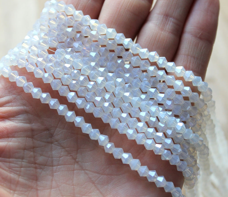 4mm Glass Bicones ~ Lustred Opalite ~ approx. 87 beads/string