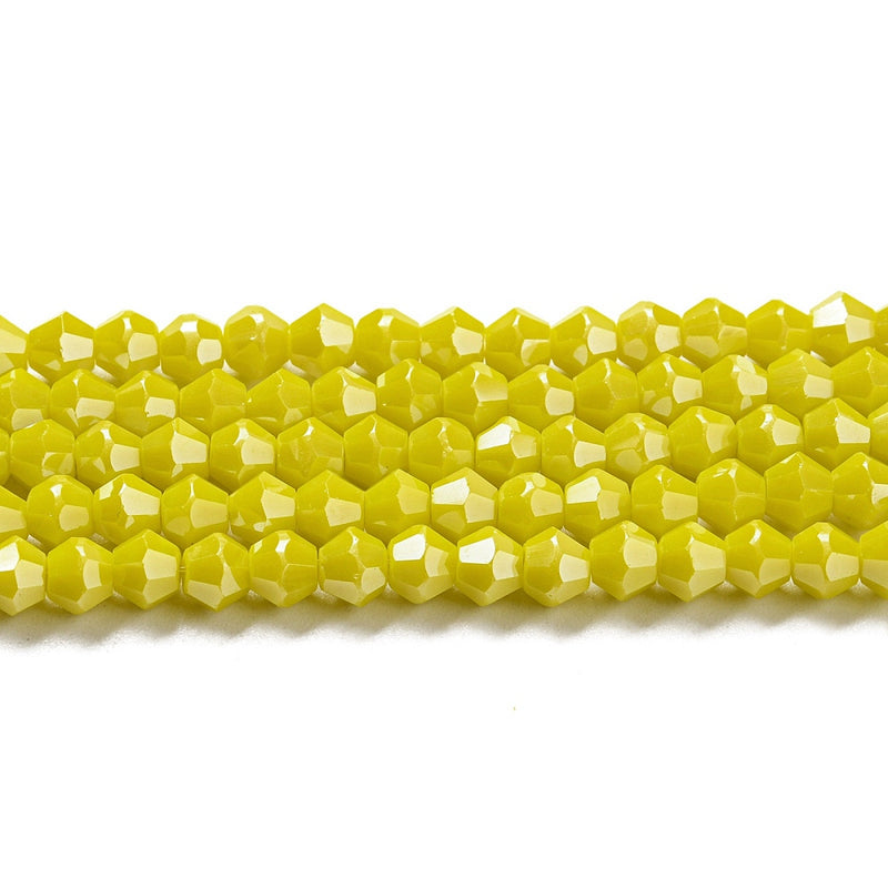 4mm Glass Bicones ~ Opaque Lustred Yellow ~ approx. 87 beads/string