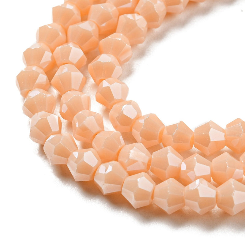 4mm Glass Bicones ~ Opaque Lustred Peach ~ approx. 87 beads/string