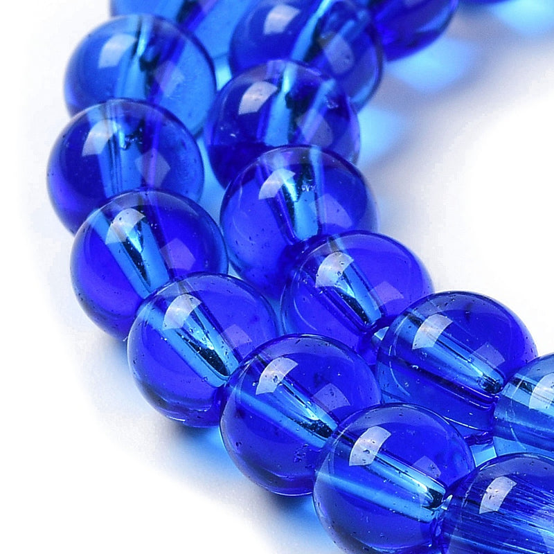 1 Strand of 6mm Glass Beads ~ Transparent Blue ~ approx. 50 beads