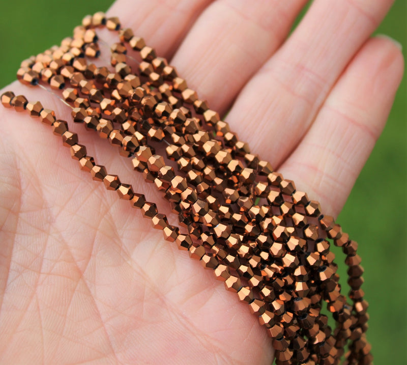 3mm Glass Bicones ~ Approx. 135 Beads / String ~ Copper Plated