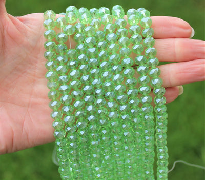 1 Strand of 8x6mm Faceted Glass Rondelle Beads ~ Lustred Lt. Green ~ approx. 72 beads