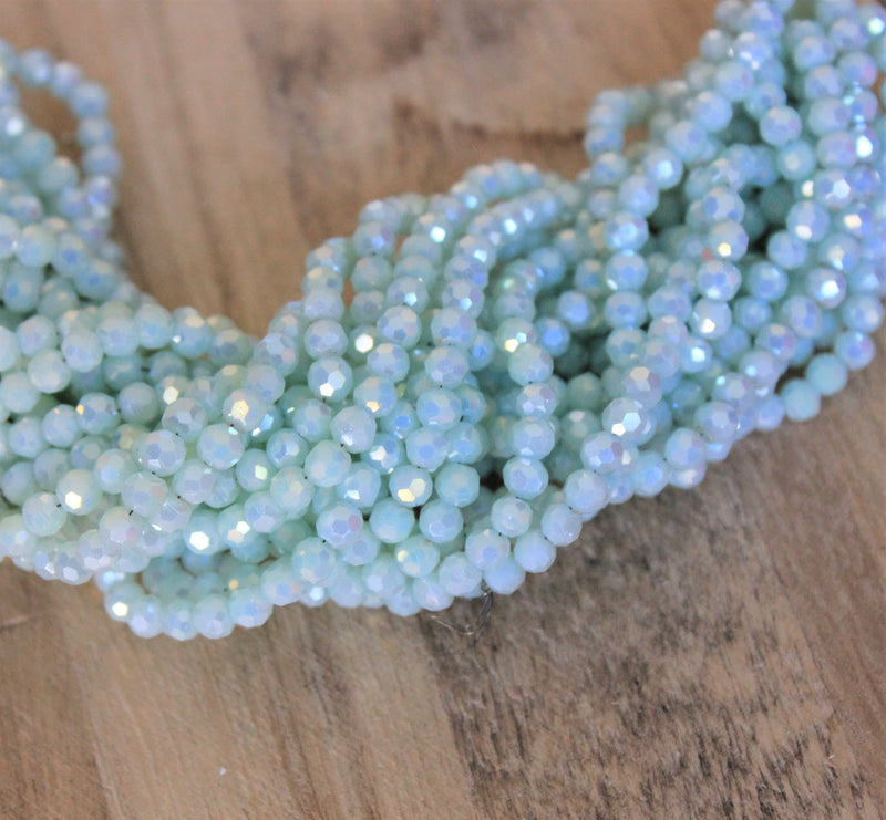 4mm Round Faceted Glass Beads ~ Lustred Pale Blue ~ approx. 95 beads/string