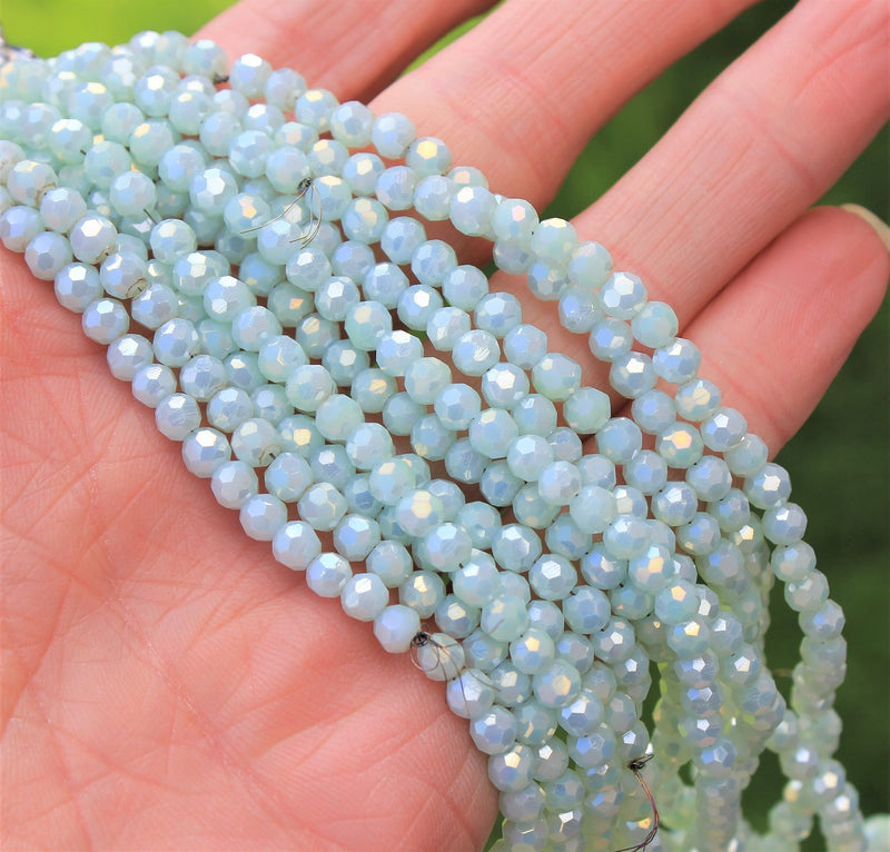 4mm Round Faceted Glass Beads ~ Lustred Pale Blue ~ approx. 95 beads/string