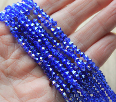 1 Strand of 2mm Glass Bicones ~  Blue AB ~ approx. 200 beads