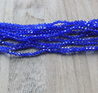 1 Strand of 2mm Glass Bicones ~  Blue AB ~ approx. 200 beads
