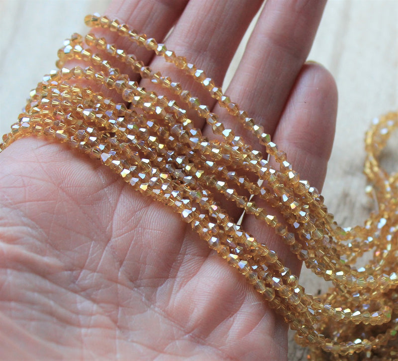 1 Strand of 2mm Glass Bicones ~  Lustred Gold ~ approx. 200 beads