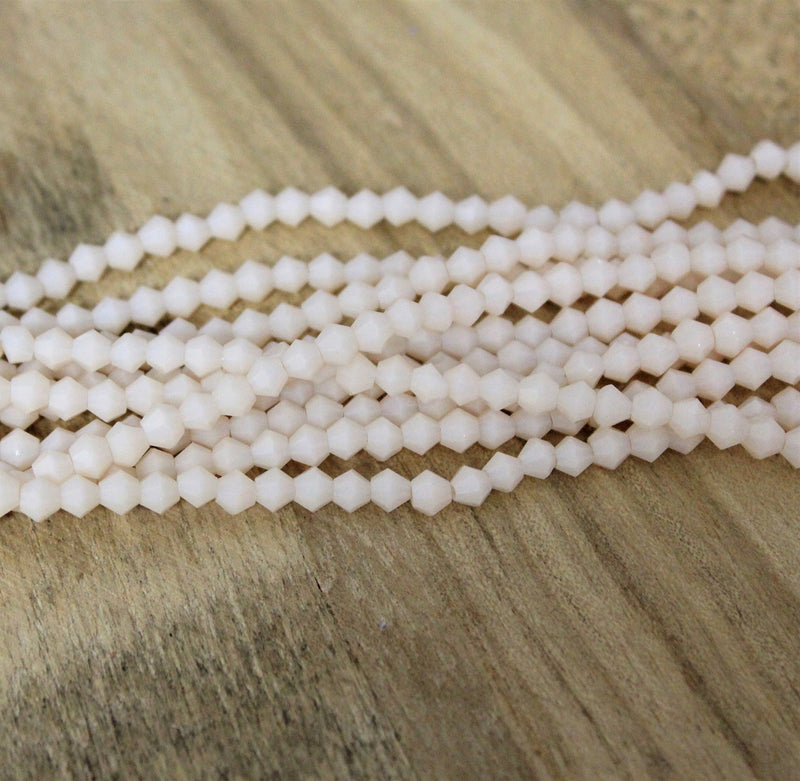 4mm Glass Bicones ~ Jade Style Light Beige ~ approx. 92 beads/string