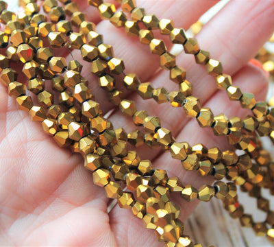 3mm Glass Bicones ~ Approx. 130 Beads / String ~ Gold Plated