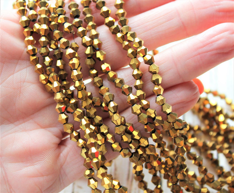 1 Strand of Electroplated Glass Bicones ~ 4mm ~ Gold Plated