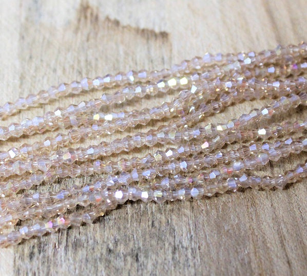 1 Strand of 2mm Glass Bicones ~  Beige AB ~ approx. 200 beads