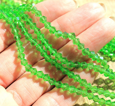 A Grade 4mm Glass Bicones ~ Green ~ approx. 85 beads/string