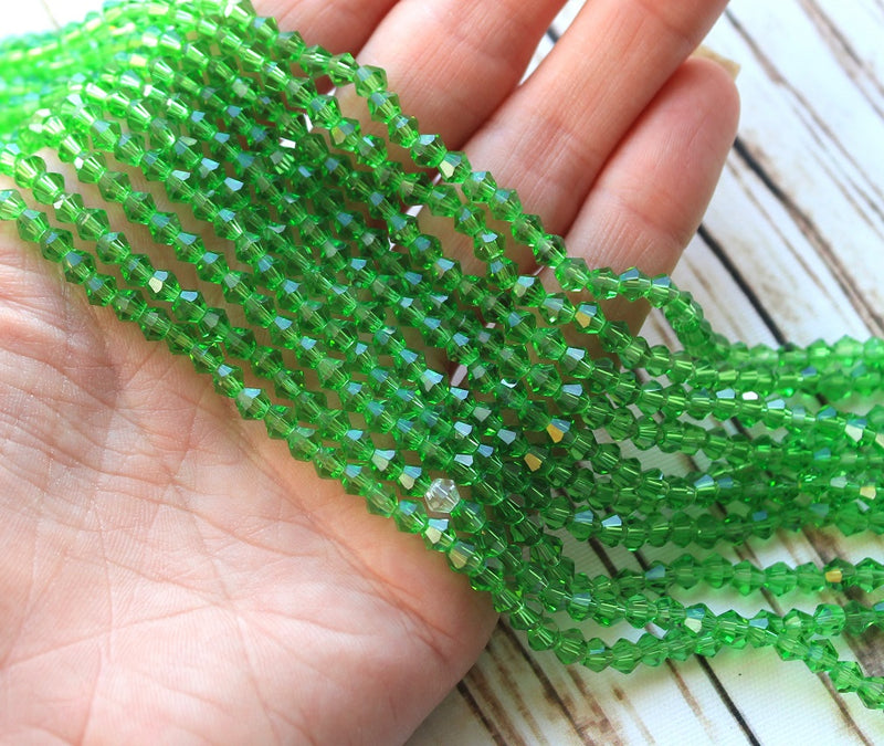 A Grade 4mm Glass Bicones ~ Green ~ approx. 85 beads/string