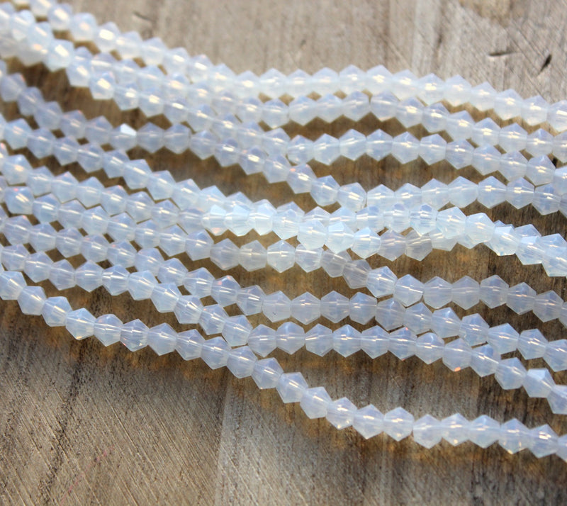 4mm Glass Bicones ~ Imitation Opalite ~ approx. 87 beads/string