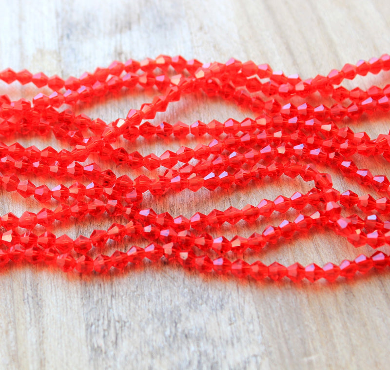 A Grade 4mm Glass Bicones ~ Red ~ approx. 85 beads/string