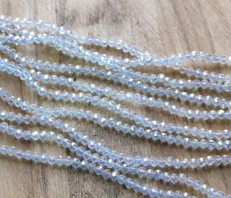 1 Strand of 4x3mm Faceted Glass Rondelle Beads ~ Lustred Opalite ~ approx. 123 beads