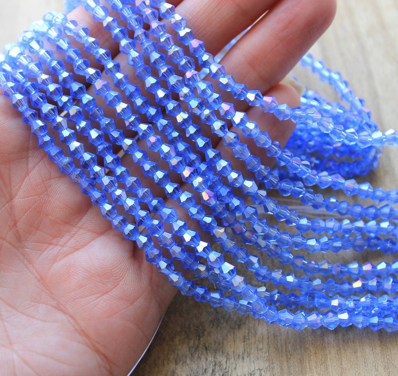 4mm Crystal Glass Bicones ~ Lustred Light Sapphire ~ approx. 70 beads/string