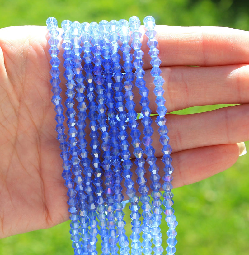 4mm Crystal Glass Bicones ~ Lustred Light Sapphire ~ approx. 70 beads/string