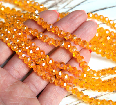 1 Strand of 6x5mm Faceted Glass Rondelle Beads ~ Lustred Light Orange ~ approx. 88 beads