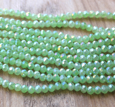 1 Strand of 6x5mm Faceted Crystal Glass Rondelle Beads ~ Jade Style Light Green AB ~ approx. 85 beads