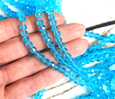 1 Strand of 6x4mm Faceted Glass Rondelle Beads ~ Transparent Sky Blue ~ approx. 88 beads