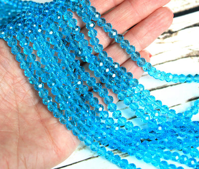 1 Strand of 6x4mm Faceted Glass Rondelle Beads ~ Transparent Sky Blue ~ approx. 88 beads