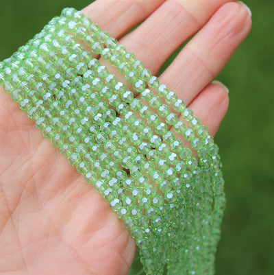 4mm Round Faceted Glass Beads ~ Lustred Light Green ~ approx. 100 beads/string