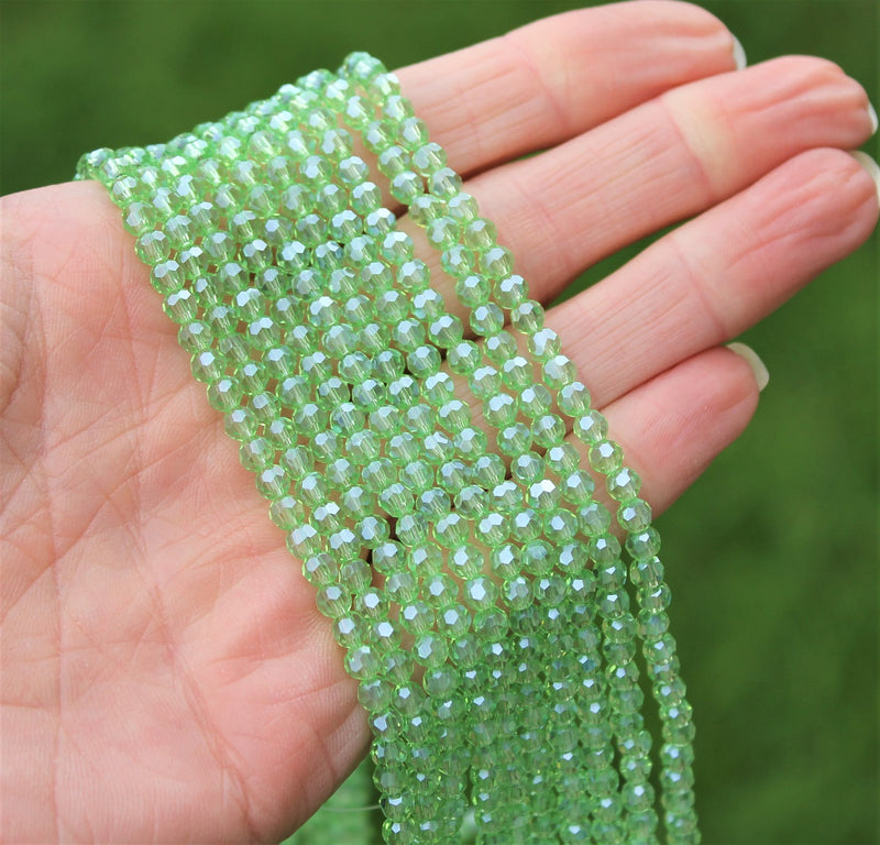 4mm Round Faceted Glass Beads ~ Lustred Light Green ~ approx. 100 beads/string