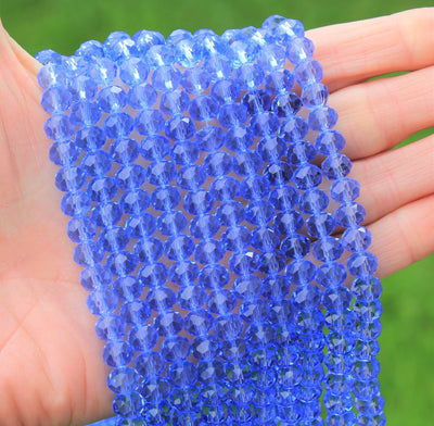 1 Strand of 8x6mm Faceted Glass Rondelle Beads ~ Transparent Cornflower Blue ~ approx. 68 beads