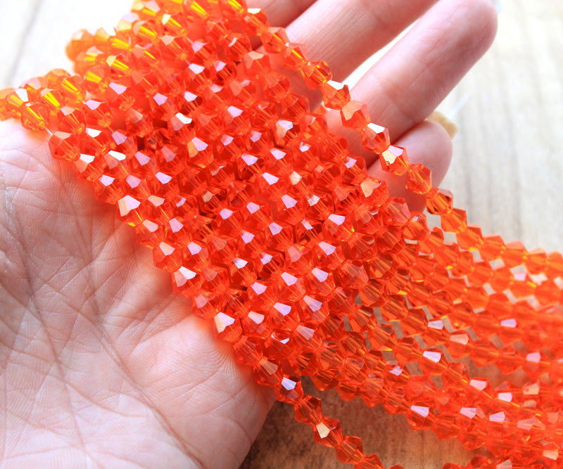 The Bead Store 6mm Glass Bicones Orange