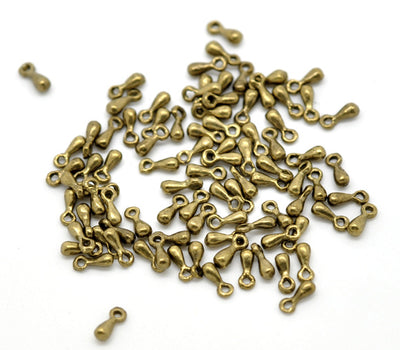 The Bead Store 10 Antique Bronze Plated Drop Shaped Charm 7x3mm