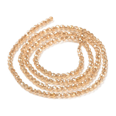 The Bead Store 2mm Round Faceted Glass Beads Lustred Light Gold approx. 180 beads / string