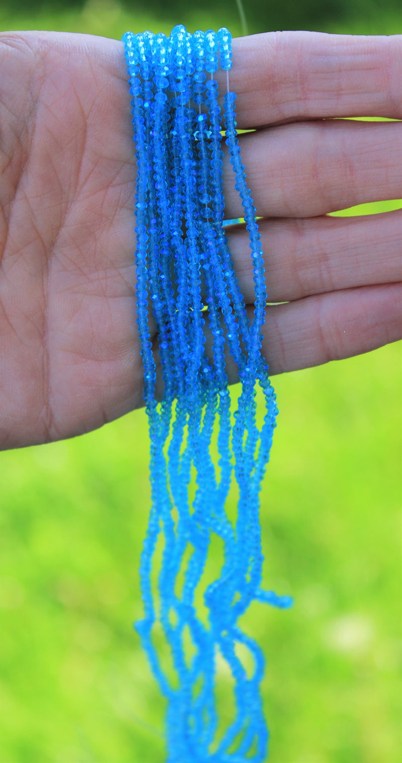 The Bead Store 2x1.5mm Faceted Glass Rondelle Beads Sky Blue AB 