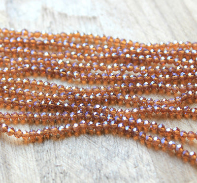 The Bead Store 3x2mm Faceted Glass Rondelle Beads Lustred Dark Amber
