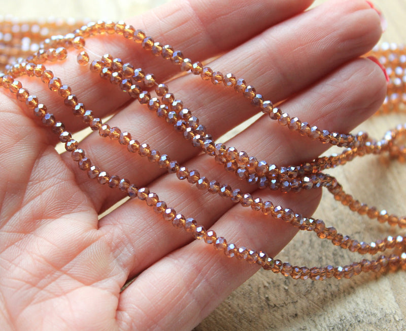 The Bead Store 3x2mm Faceted Glass Rondelle Beads Lustred Dark Amber