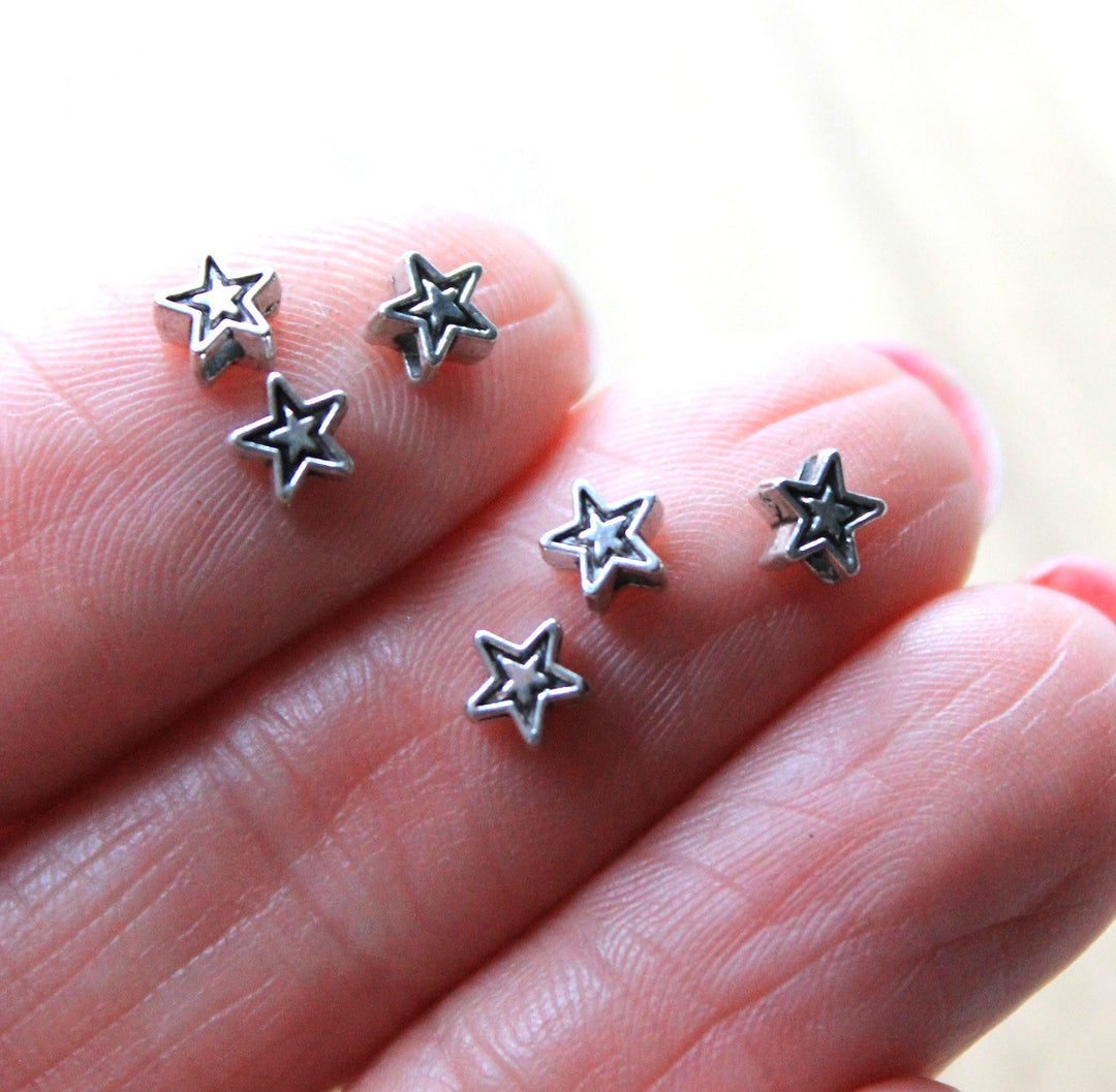 Silver star beads sales