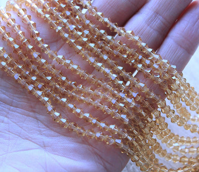 The Bead Store 4mm Glass Bicones Gold approx. 80 beads