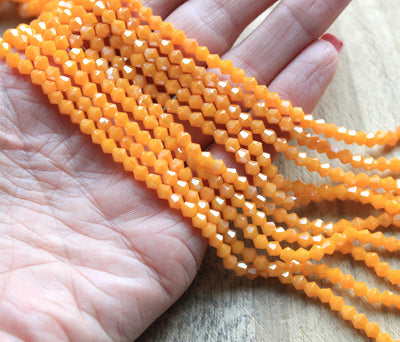 The Bead Store 4mm Glass Bicones ~ Opaque Lustred Light Orange ~ approx. 85 beads/string