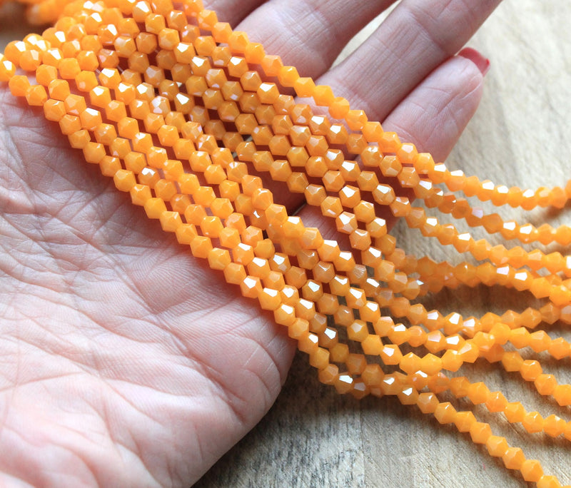 The Bead Store 4mm Glass Bicones ~ Opaque Lustred Light Orange ~ approx. 85 beads/string