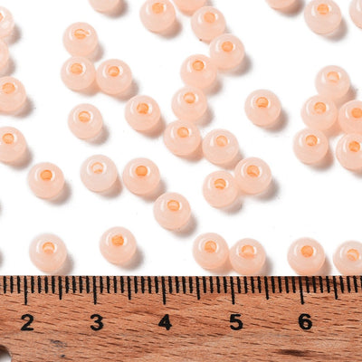 The Bead Store 5.5x3.5mm Jade Colours Glass Seed Beads Light Apricot 20 grams