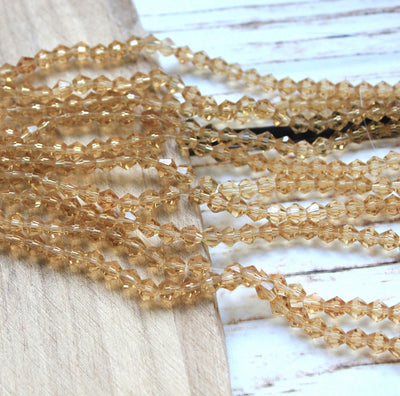 The Bead Store 6mm Glass Bicones Light Gold 