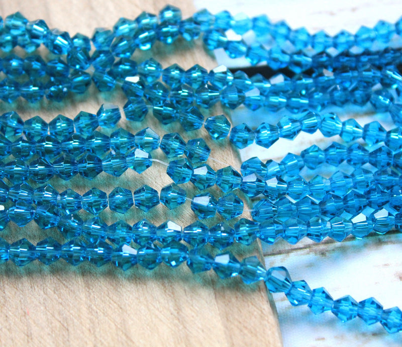 The Bead Store 6mm Glass Bicones Teal 