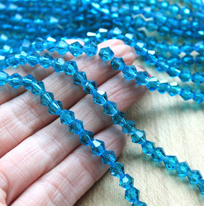 The Bead Store 6mm Glass Bicones Teal 