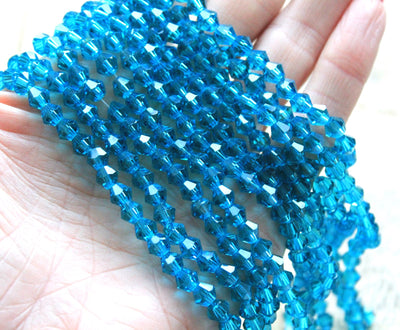 The Bead Store 6mm Glass Bicones Teal 