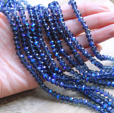 The Bead Store 6x5mm Faceted Glass Rondelle Beads Montana Blue AB