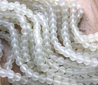 The Bead Store  8mm Round Frosted Glass Beads Light Champagne 99 beads
