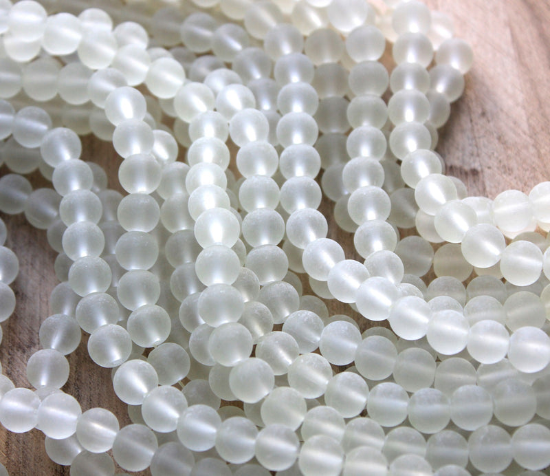 The Bead Store  8mm Round Frosted Glass Beads Light Champagne 99 beads