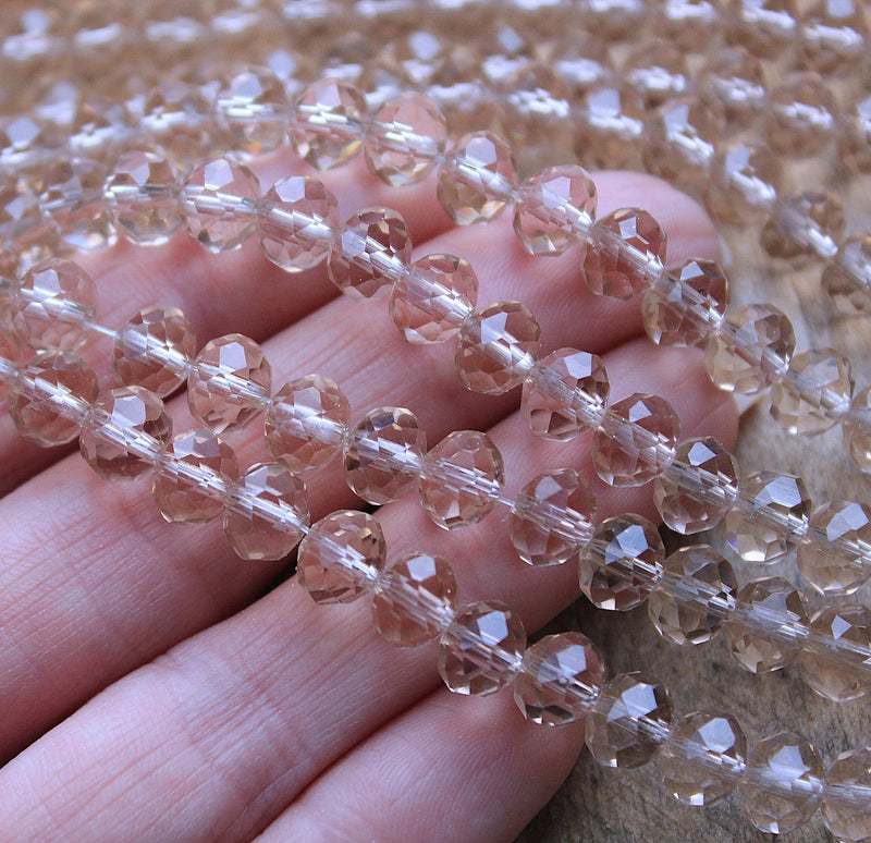 The Bead Store 8x6mm Faceted Glass Rondelle Beads Transparent Beige 65 beads string