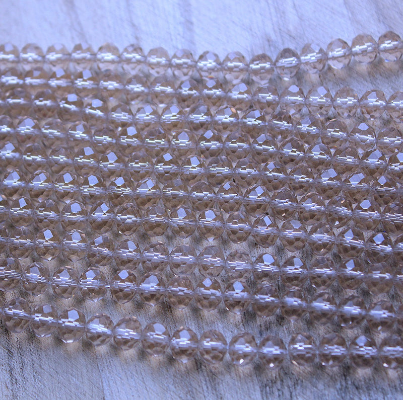 The Bead Store 8x6mm Faceted Glass Rondelle Beads Transparent Beige 65 beads string