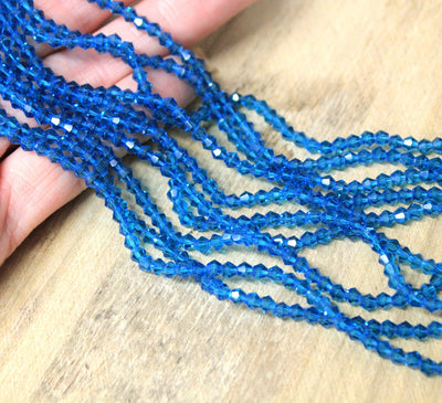 The Bead Store A Grade 3mm Glass Bicones ~ Teal ~ approx. 110 beads/string